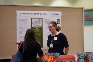 Photo of Dr. Zuegge during the presentation at the UW Health Sustainability Celebration.