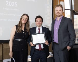 Photo of Resident Teacher of Medical Students awarded to Stephen Lockwood.