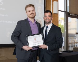 Photo of Outstanding Senior Resident, Ryan Henschell.